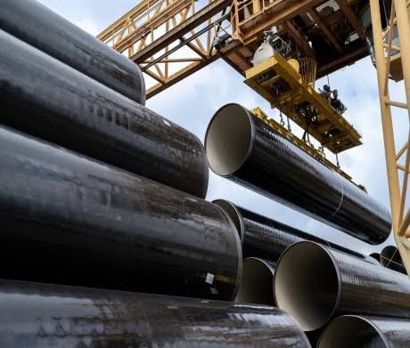 Large steel pipes at an industrial facility